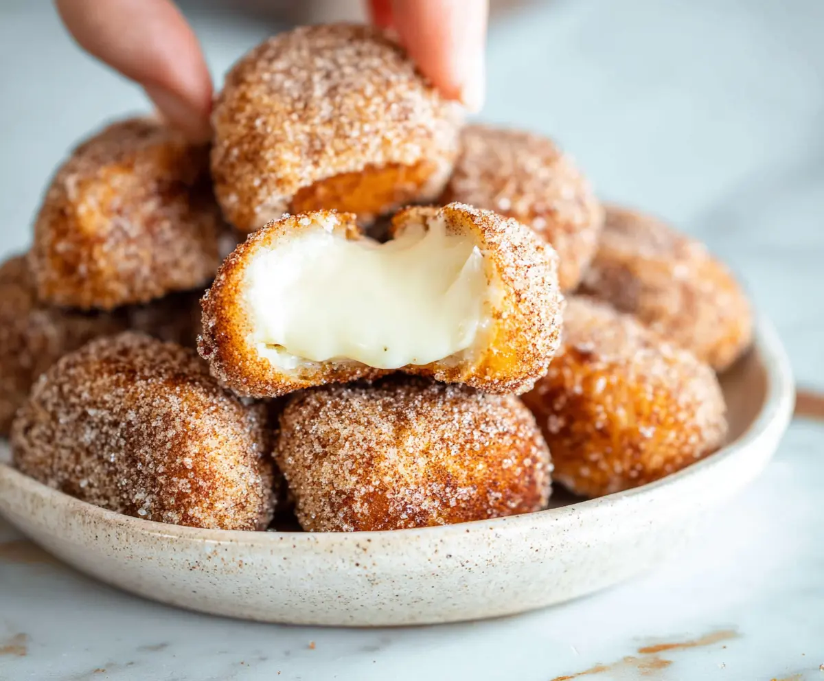 Delicious Cinnamon Cream Cheese Bites on a plate, perfect for snacks and parties