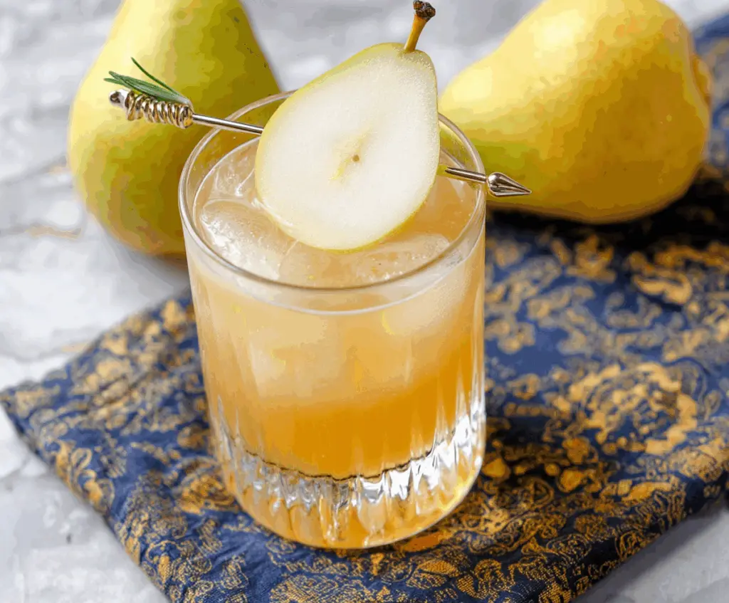 Refreshing Ginger Pear Bourbon Cocktail in a glass with fresh pear slices and ginger garnish
