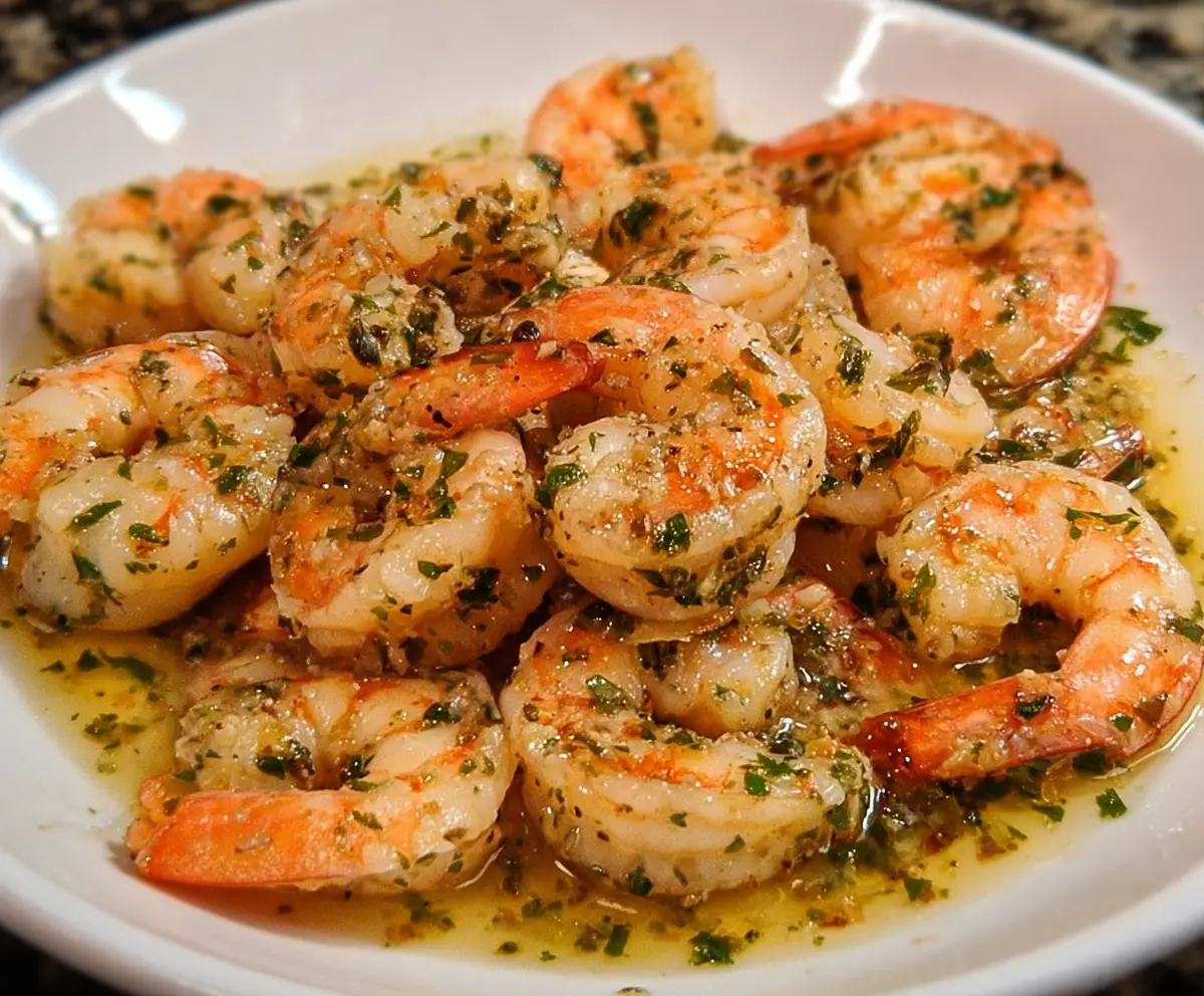 Delicious Red Lobster Shrimp Scampi dish featuring juicy shrimp in a flavorful garlic butter sauce served with pasta.