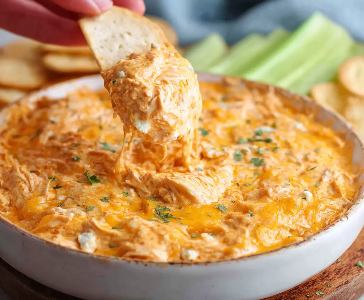 Delicious buffalo chicken dip with creamy cheese served as a flavorful appetizer.