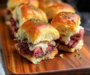 Delicious corned beef sliders on a platter, perfect for parties and snacks.